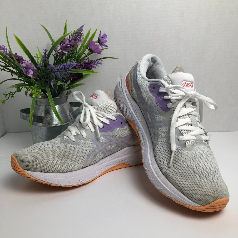 The Women's Asics 9 athletic running sneakers